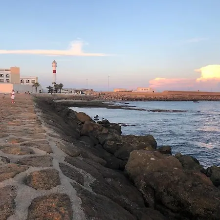 Luz, Sol Y Arena Rota